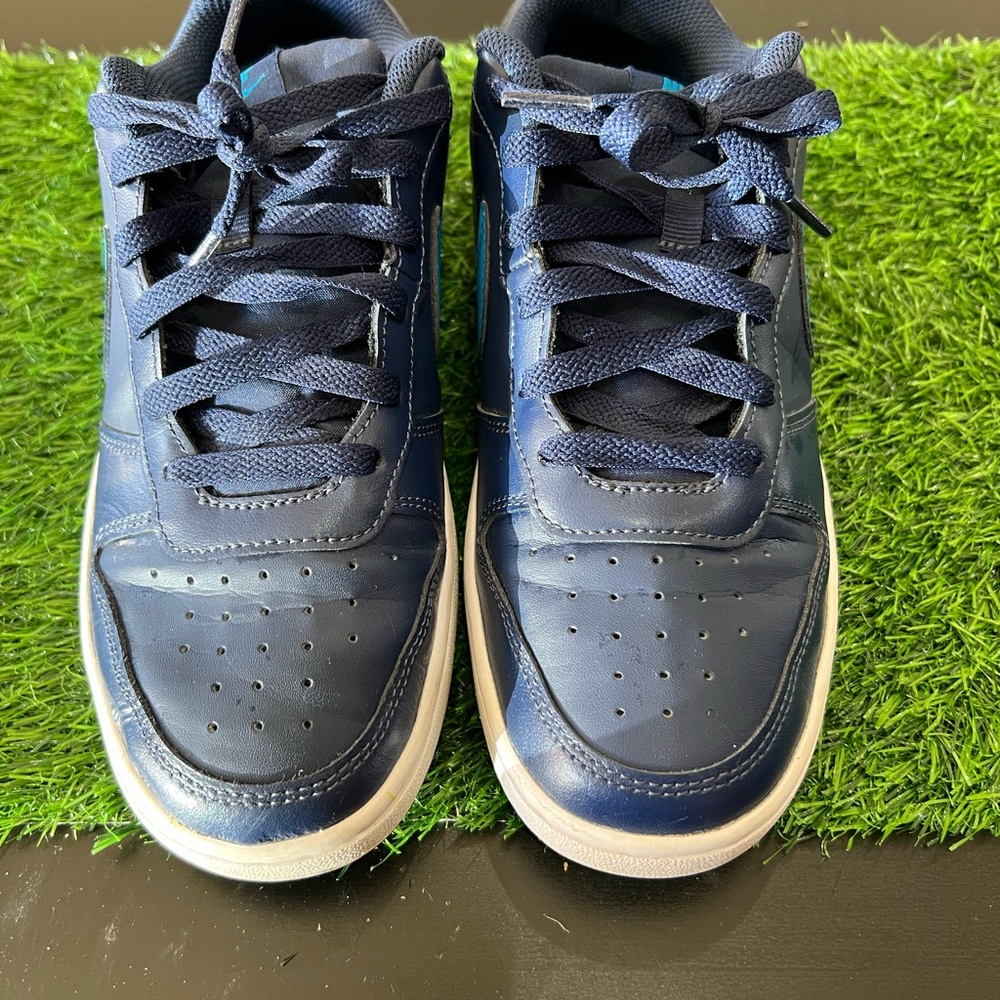 Youth size 6.5 Nike Navy Sneakers